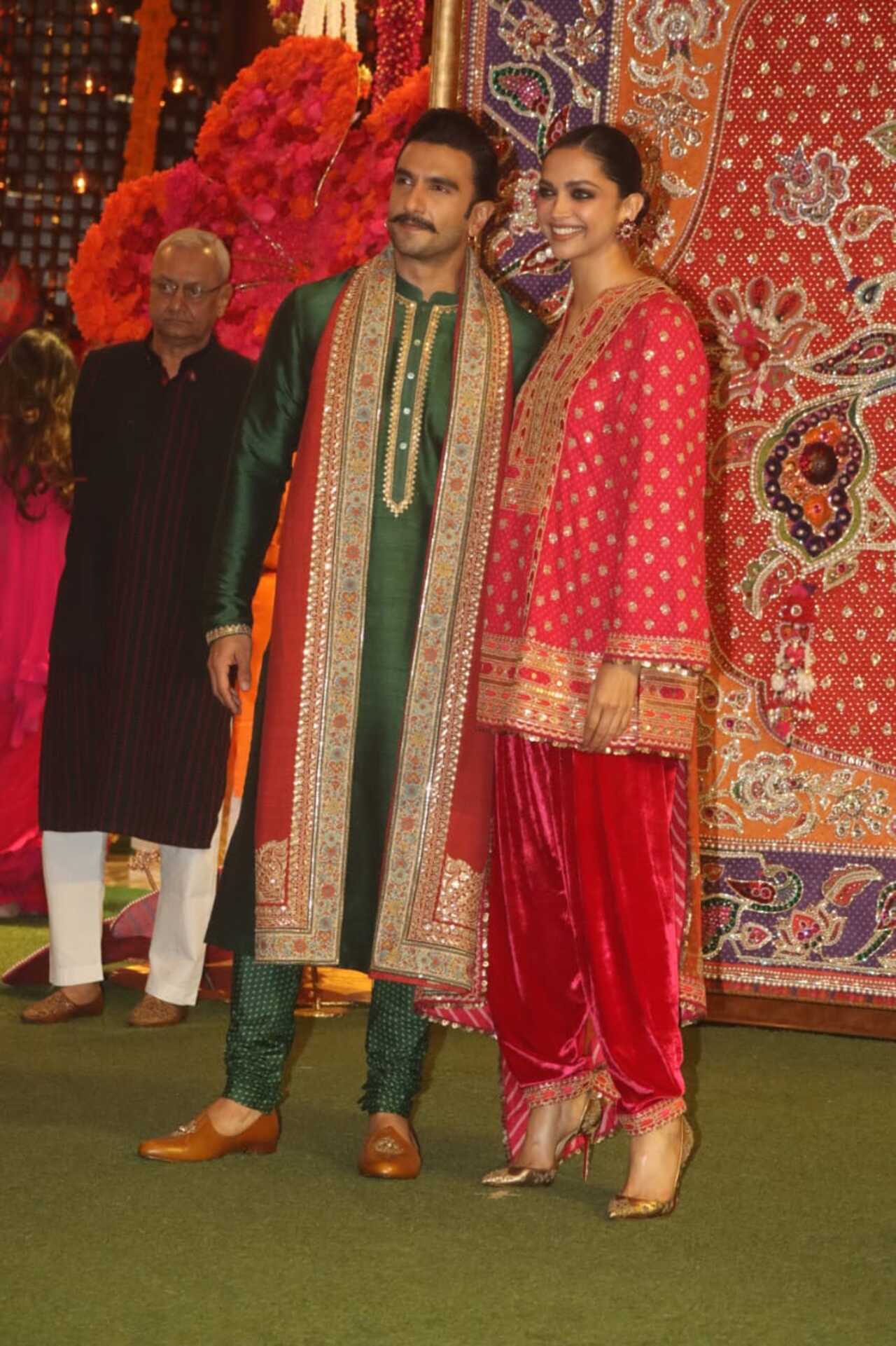 Ranveer Singh and Deepika Padukone attended the Ambanis' Ganesh Puja. The actress wore a bright red outfit whereas he opted for green